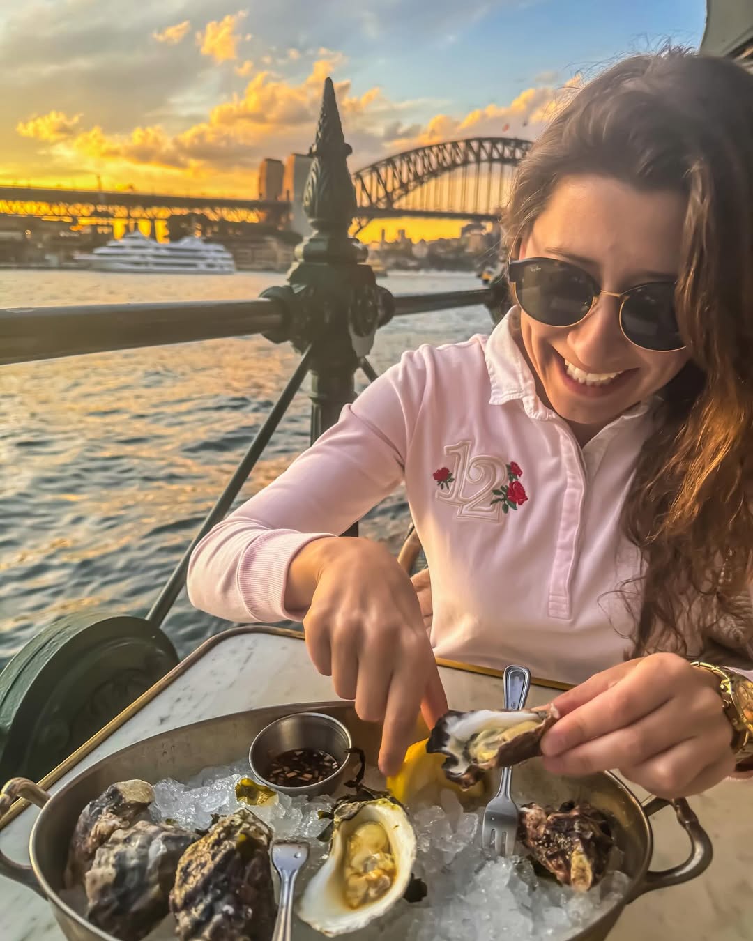 Vanessa Sebben at Sydney Harbour, exploring career growth insights while curating content for one of her newsletters, The Oyster Rule. (Photo source: Vanessa Sebben/LinkedIn)